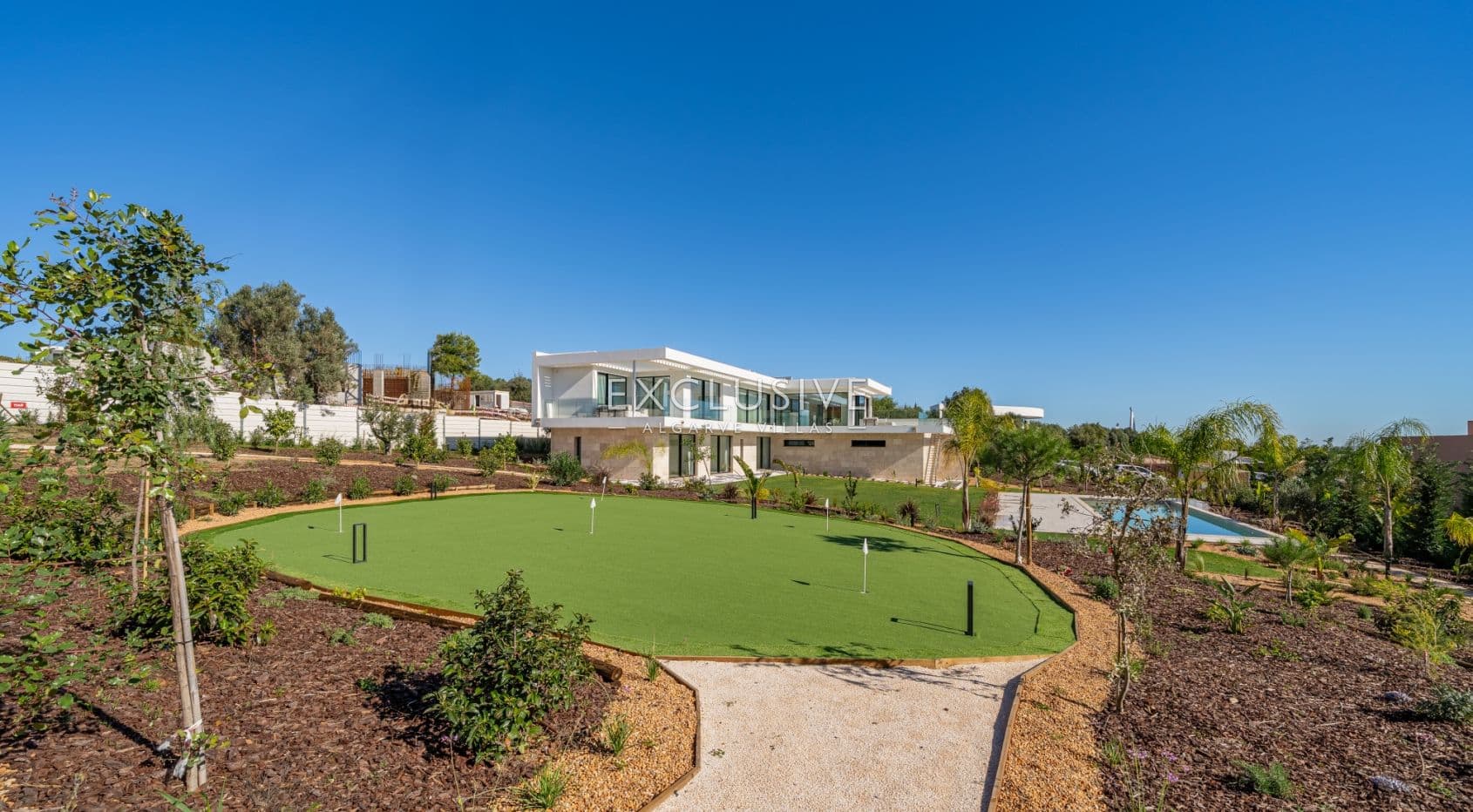 Buy 4 bedroom contemporary villa with golf and ocean views on Palmares golf course Lagos Algarve
