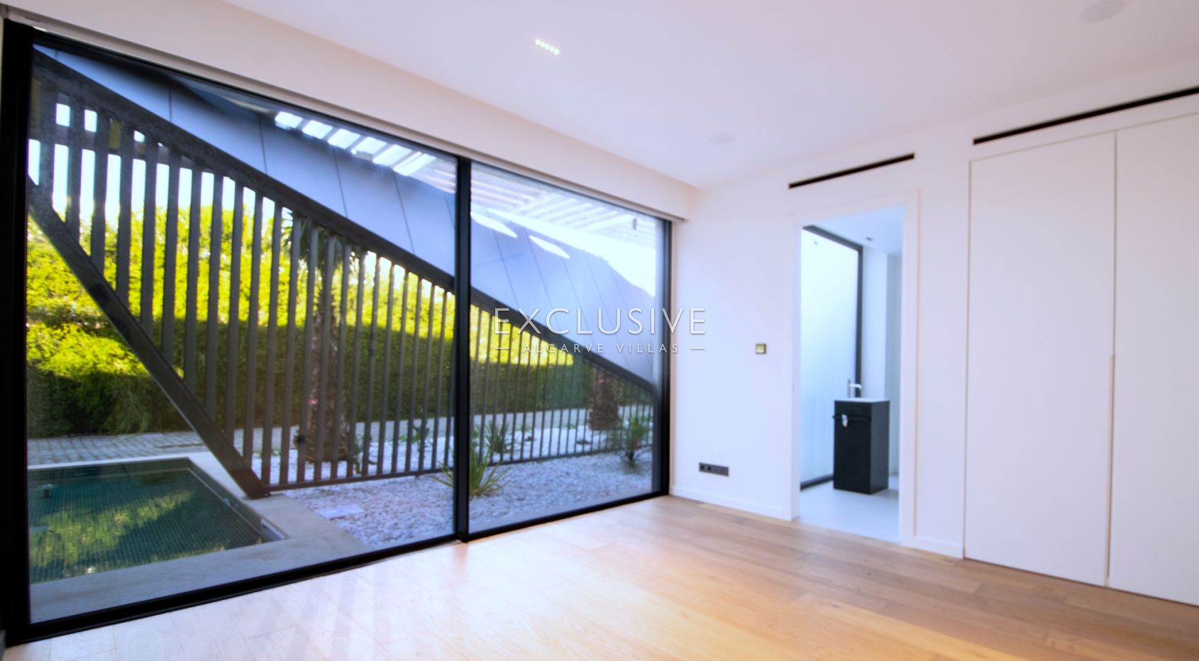 Buy 4 bedroom contemporary villa with pool and stunning sea views in Carvoeiro, Algarve