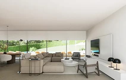 Contemporary villa lounge with floor-to-ceiling windows onto the garden