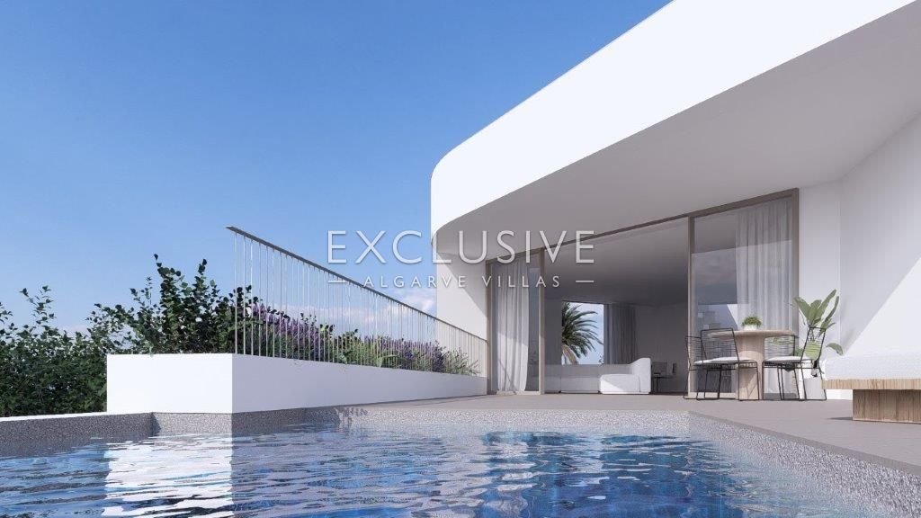 Building plot with approved project by renowned architect close to centre of Luz, Algarve