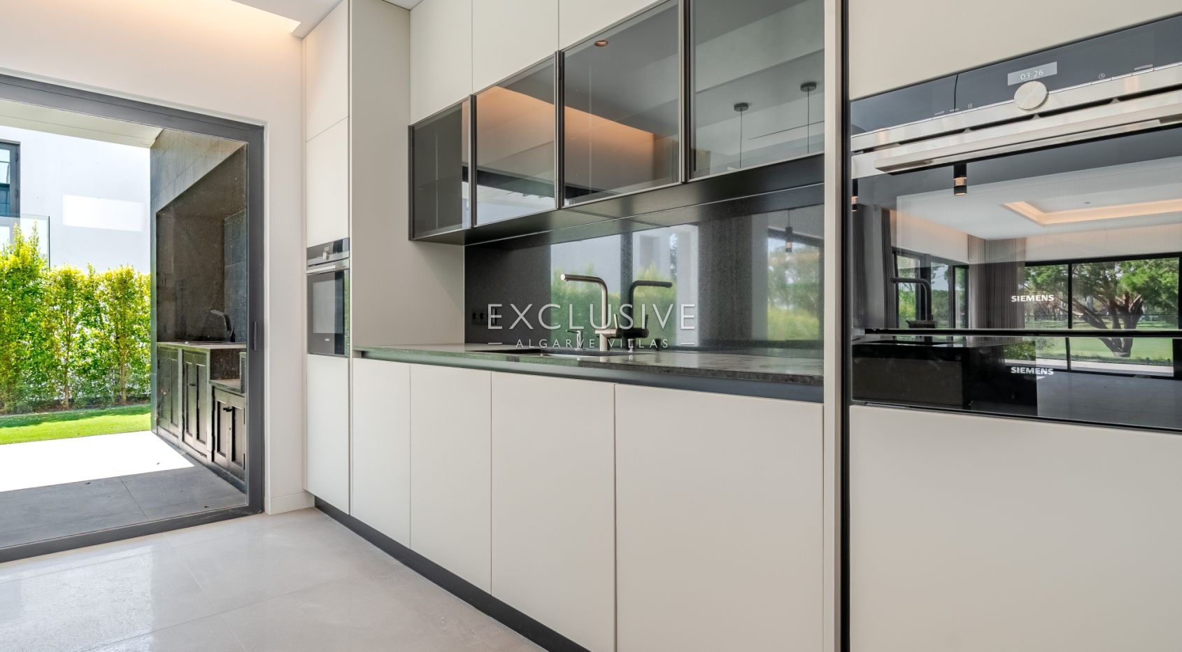 Buy Luxurious 4+1 Bedroom Villa with Pool Overlooking Els Golf Course in Vilamoura